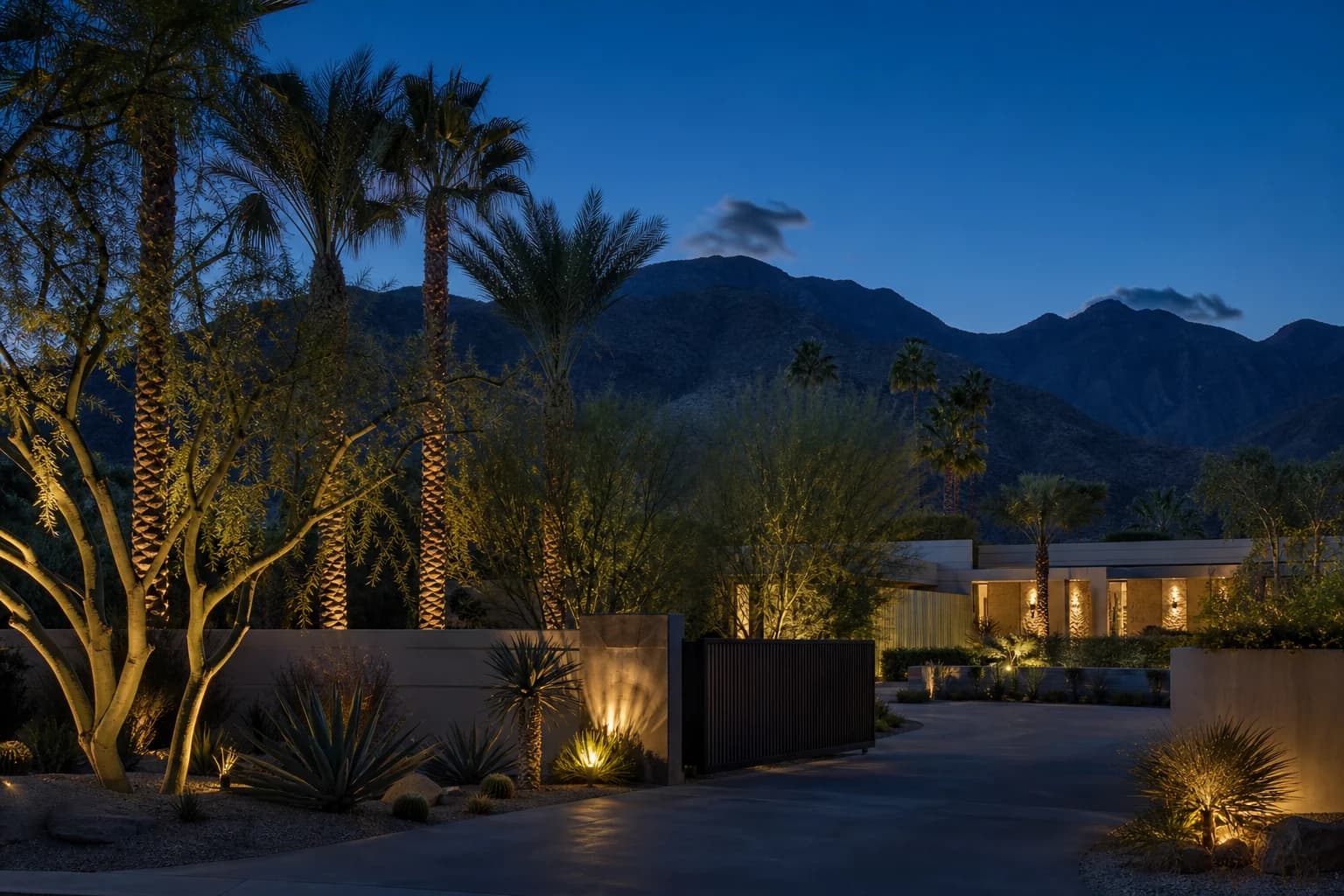 Private Rancho Mirage estate with mature palms, desert landscaping, and discreet lighting